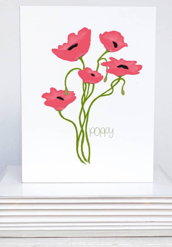 a bunch of red poppies on note cards