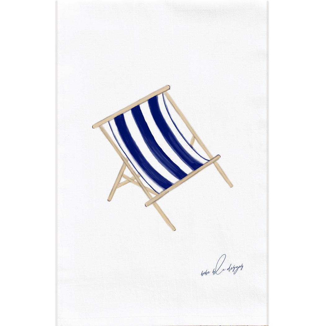 A navy blue and white stripped deck chair on a flour sack towel