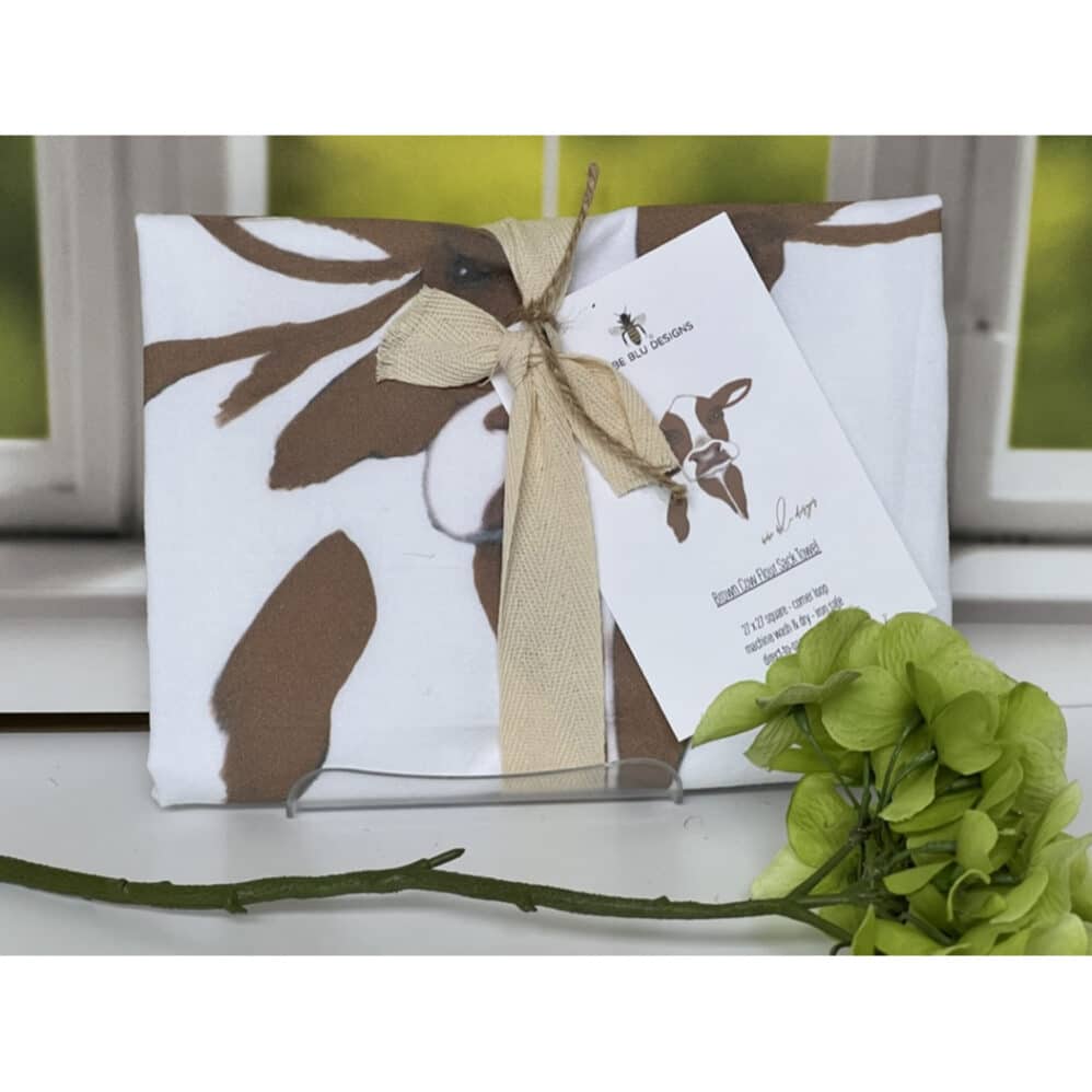 brown cow flour sack towel wrapped