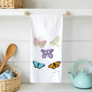 Colorful butterflies and a luna moth on a flour sack tea towel