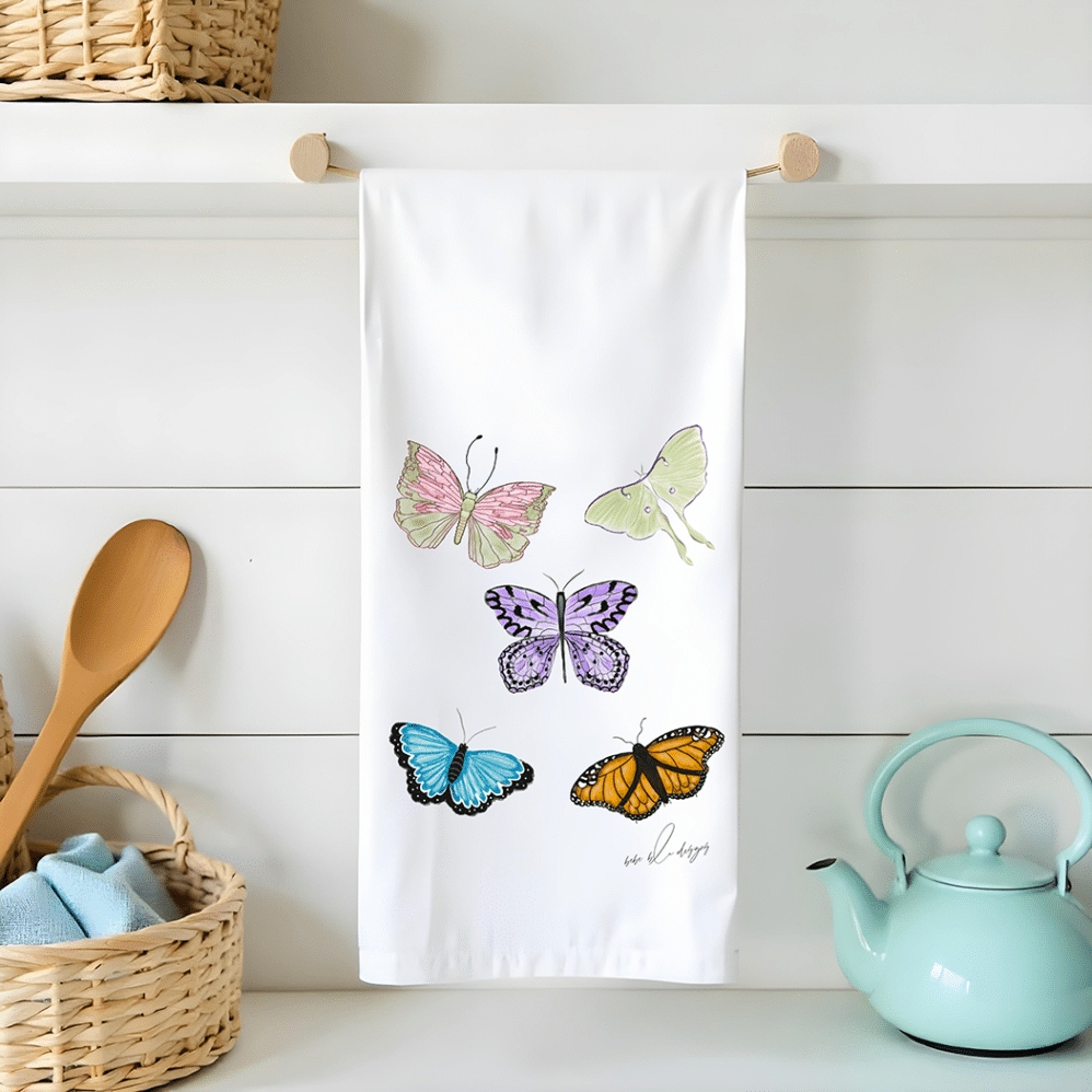 Colorful butterflies and a luna moth on a flour sack tea towel