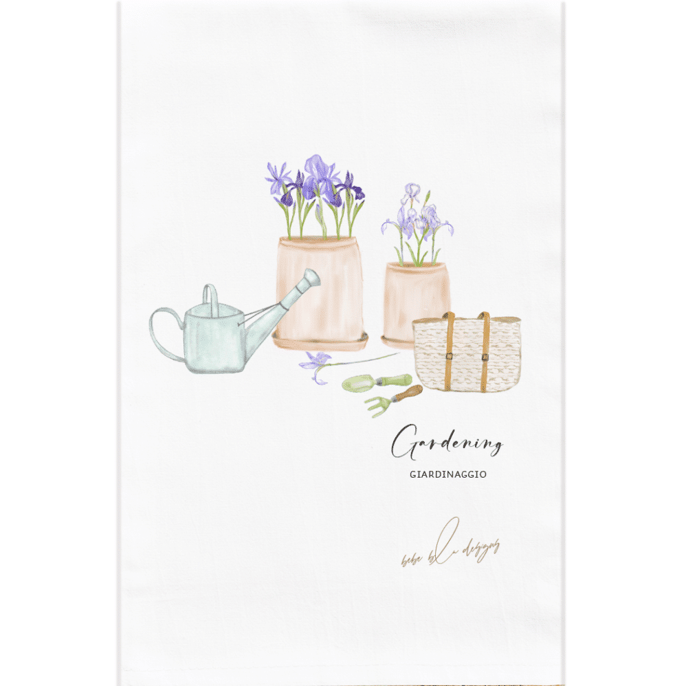 A gardening flour sack towel with the Italian word giardinaggio featuring two clay pots filled with Iris, watering can, garden tools and a garden bag with leather straps