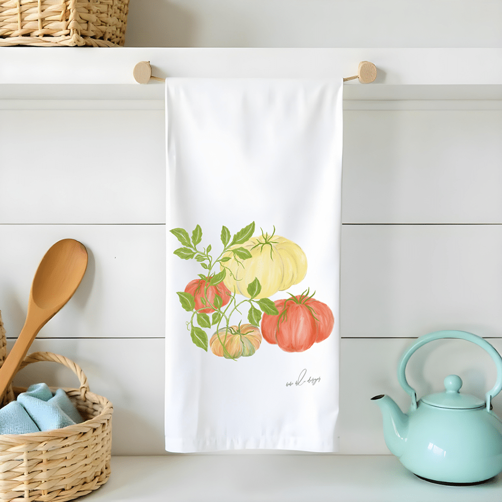 colorful heirloom tomatoes on a flour sack tea towel