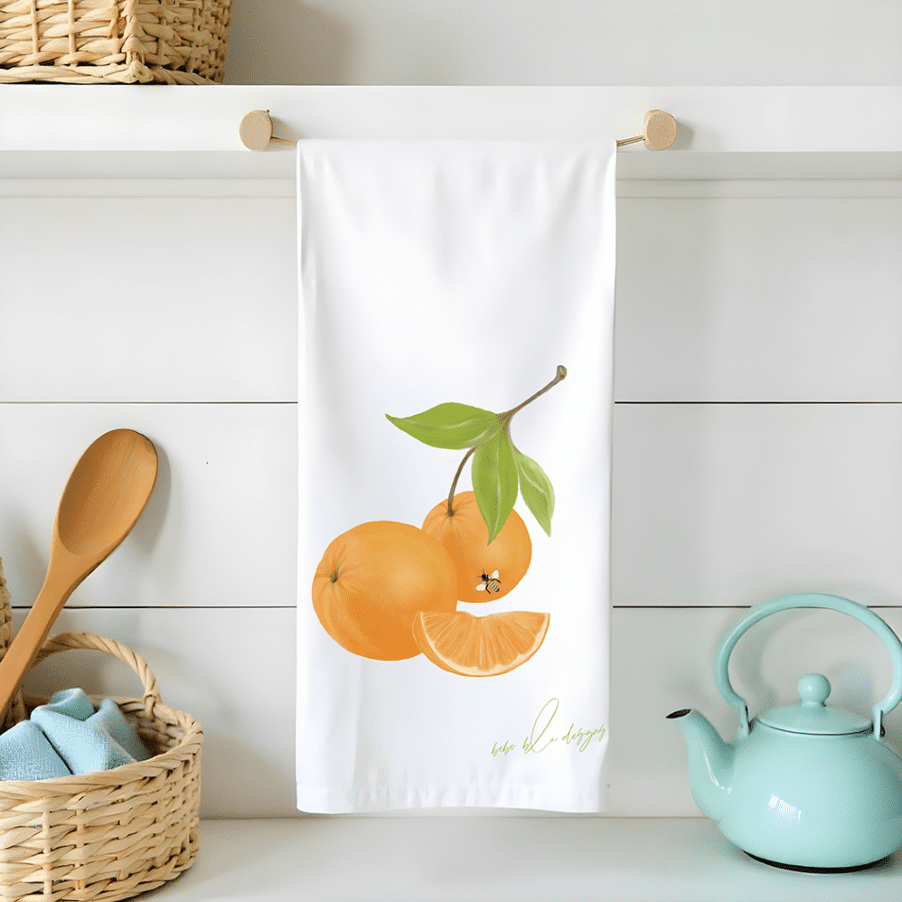 oranges on a flour sack tea towel