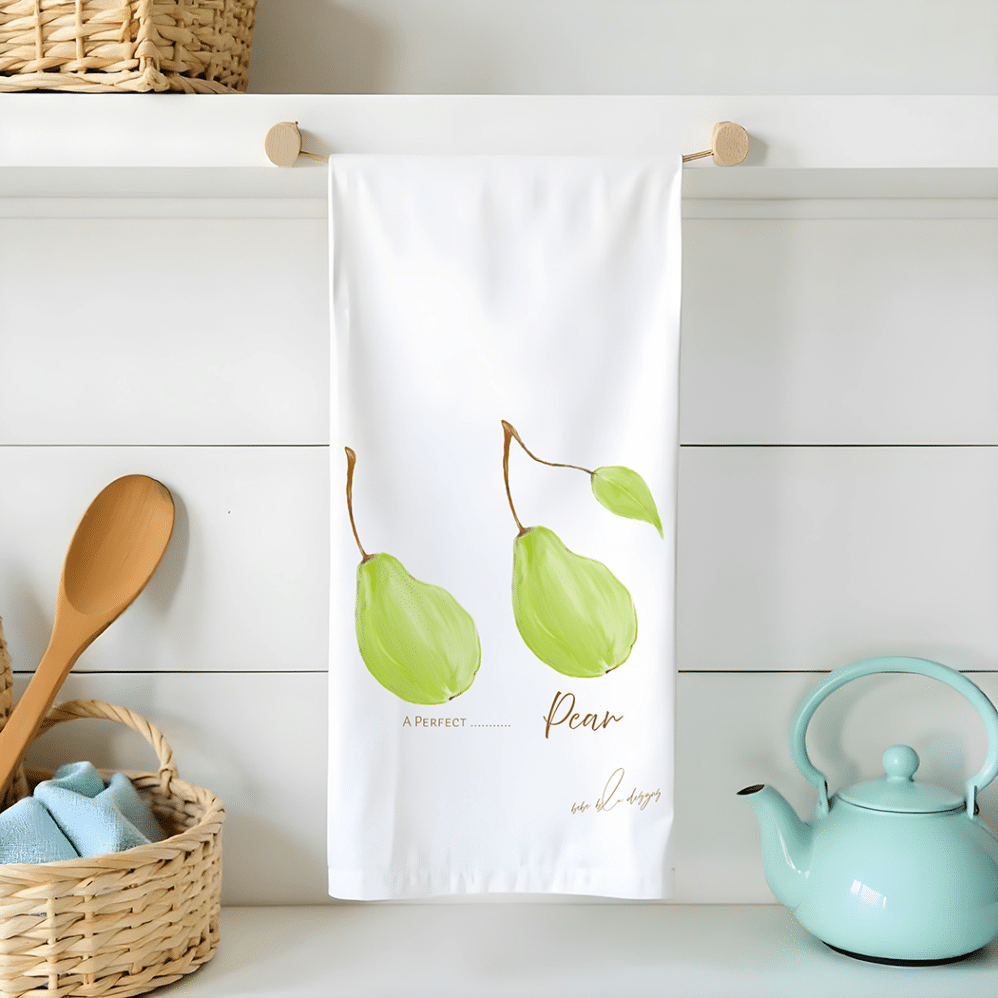 2 pears on a flour sack towel with the wording..a perfect pair!