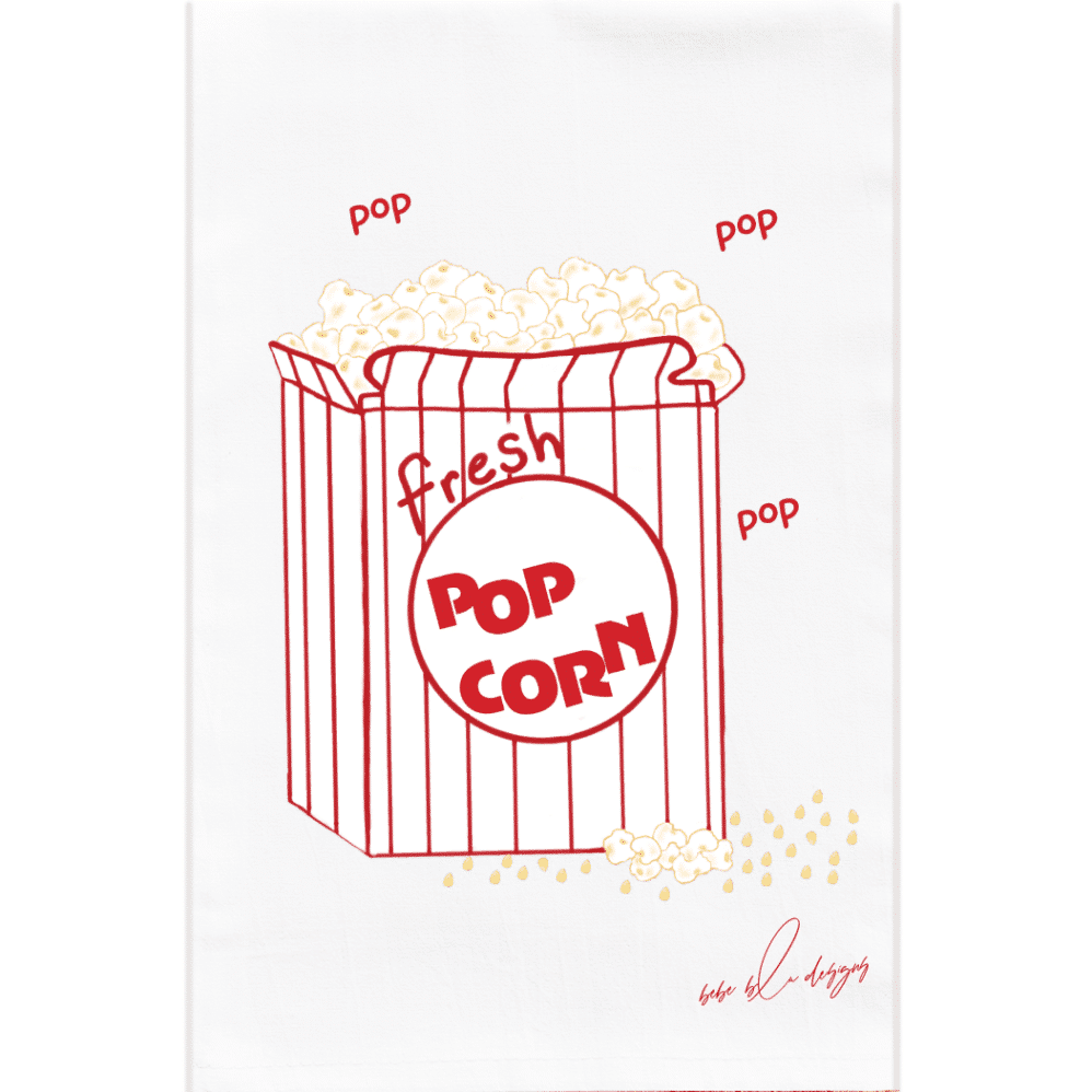 a red and white box of popcorn with popcorn and kernels and the words 'POP, POP, POP' on a flour sack towel
