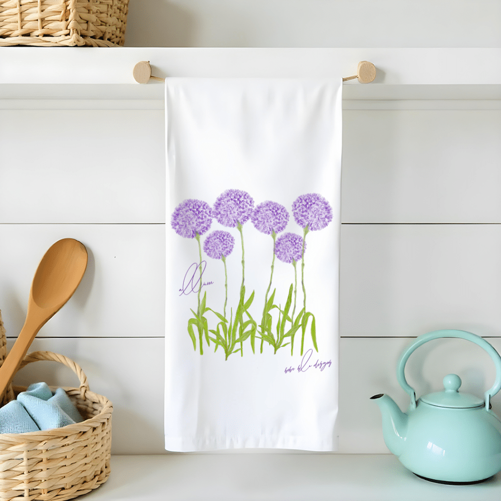 purple allium on a flour sack tea towel