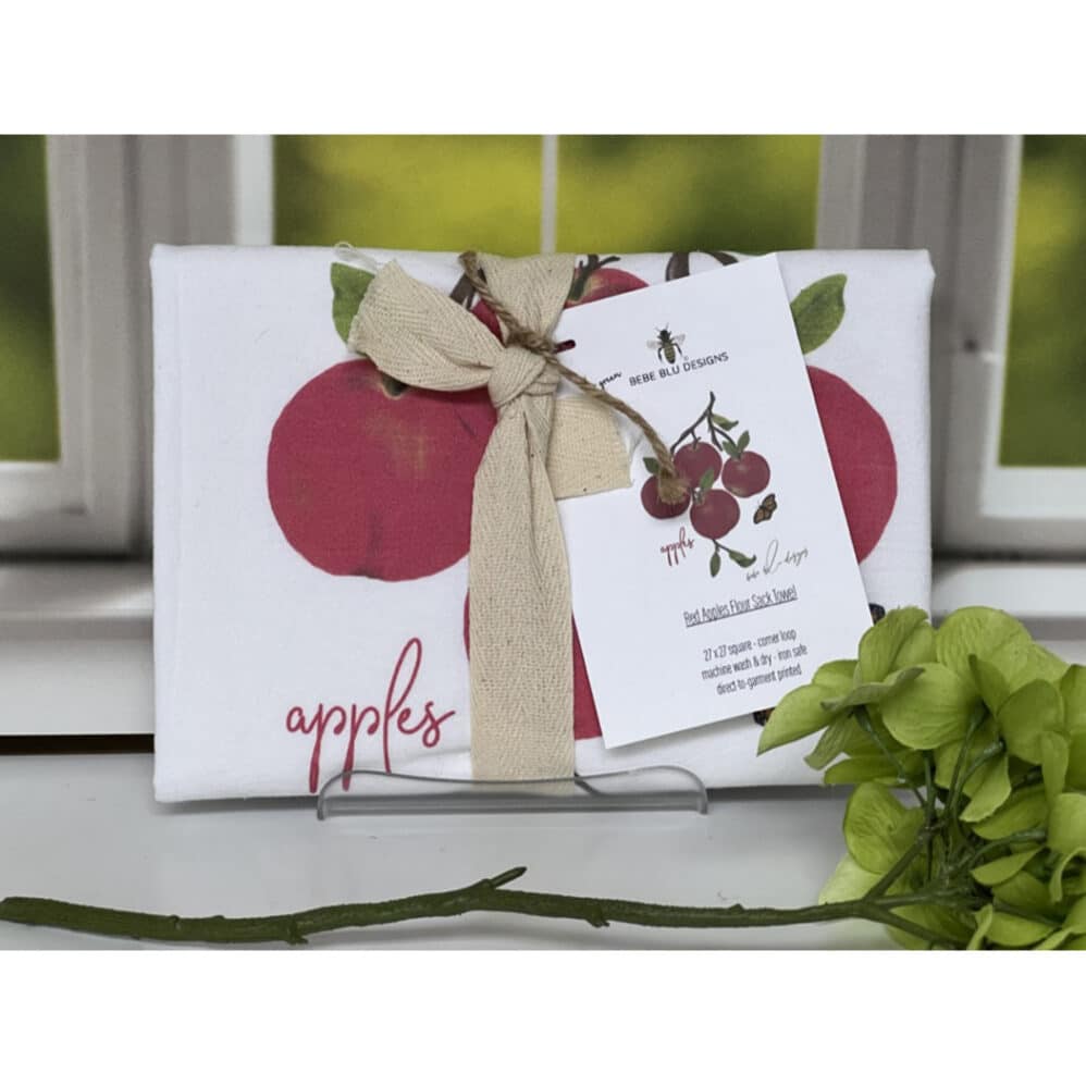 red apples flour sack towel wrapped
