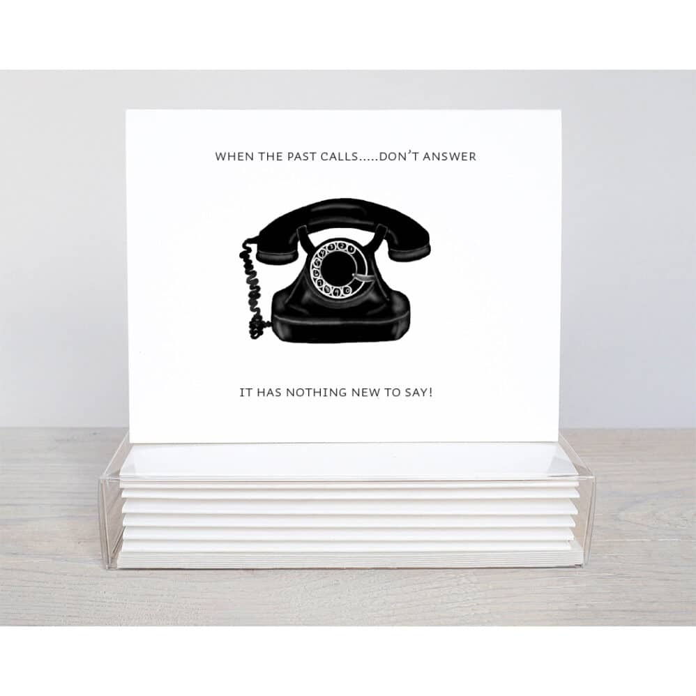 vintage telephone with the saying; if the past calls..don't answer, it has nothing new to say.