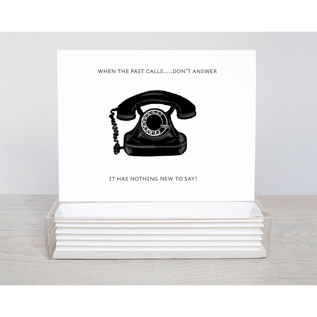 vintage telephone with the saying; if the past calls..don't answer, it has nothing new to say.