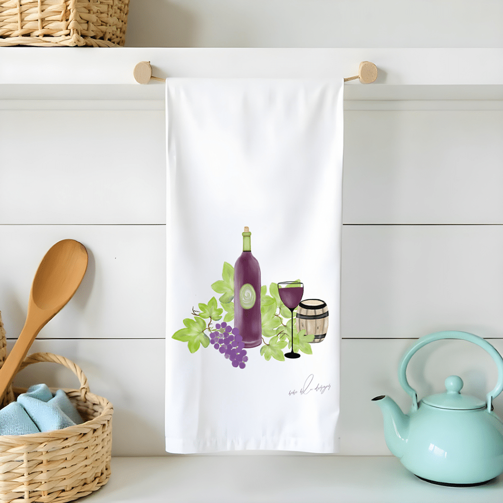 wine and grapes on a flour sack tea towel