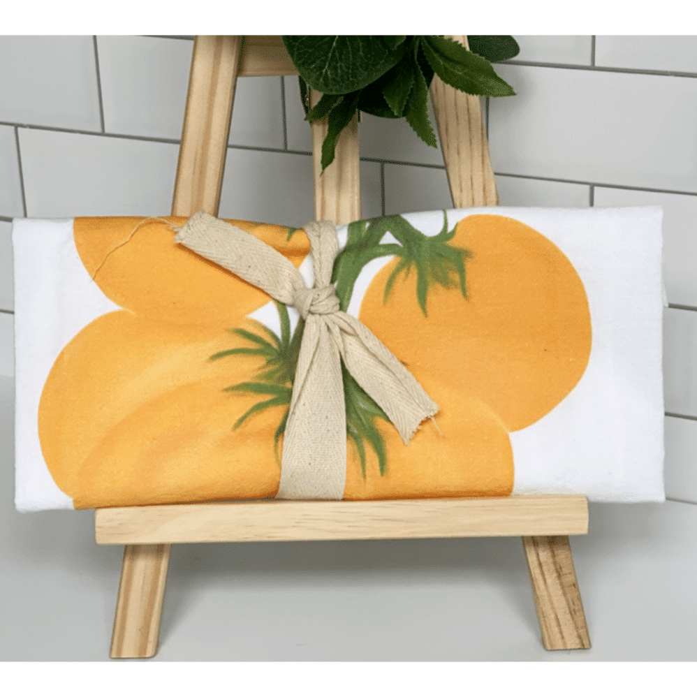 yellow tomatoes flour sack towel wrapped